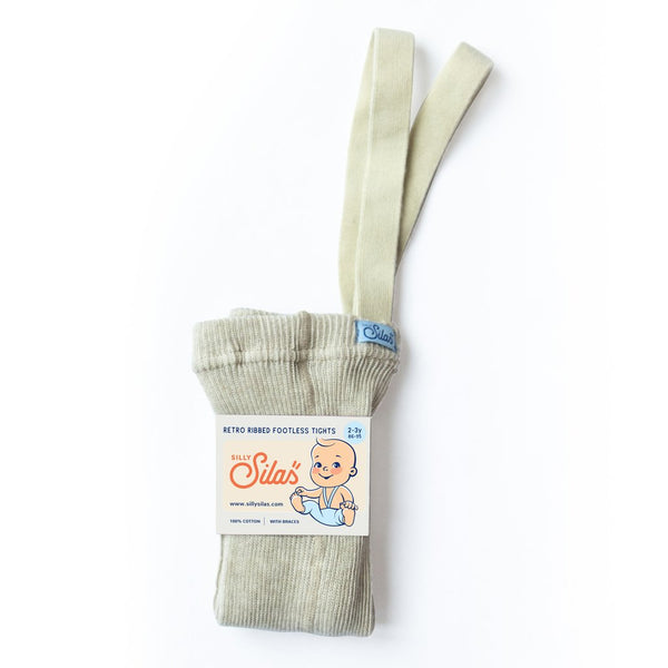 US stockist of Silly Silas gender neutral retro ribbed footed tights in cream blend.  Made from 100% cotton and featuring braces.