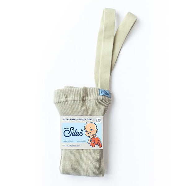 US stockist of Silly Silas gender neutral retro ribbed footed tights in cream blend.  Made from 100% cotton and features braces.