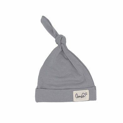 Stockist of Bonsie's rayon blend fog grey knotted baby hat. 