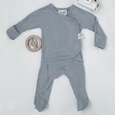 Stockist of Bonsie's rayon blend fog grey footie.  Top section has velcro wrap body which can be undone for skin to skin contact.  Elastic waist that can be pulled down for easy diaper changes. 