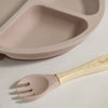 US stockist of Foxx & Willow's Dusty Blush silicone suction plate with 3 sections. Comes with matching wood + silicone fork.  Plate measures 7.80" in diameter and fork measures 5.51" in length.