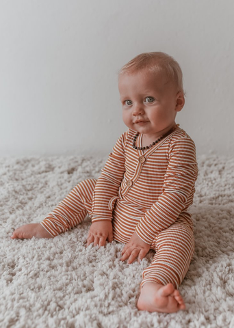 US Stockist of Aubrie Posie Playsuit in Forget Me Knot Knit