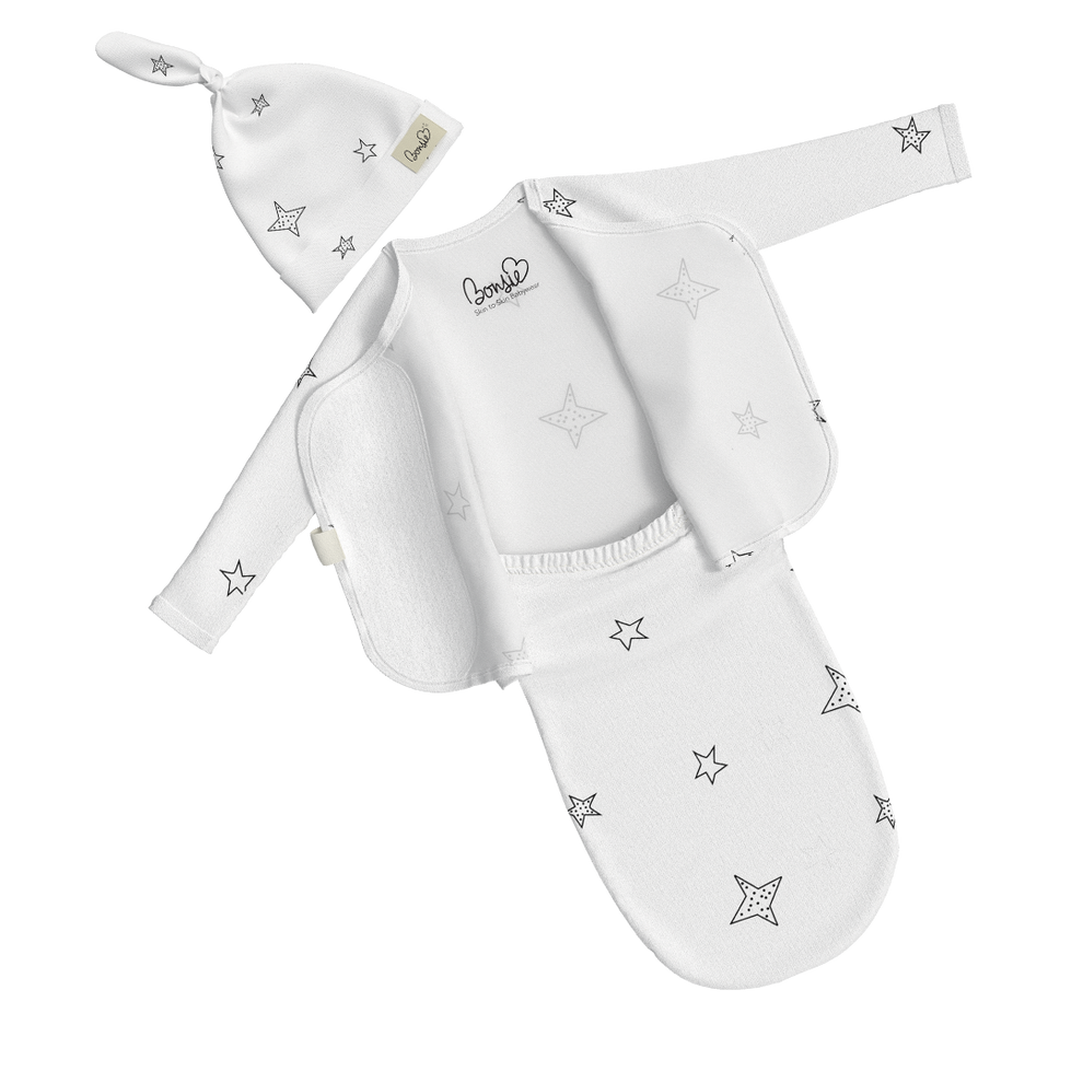 Stockist of Bonsie's rayon blend baby gown in gender neutral white fabric with star print.  Features cross over velcro top that can be undone for skin to skin.  Elastic waist which can be pulled down for easy diaper changes.