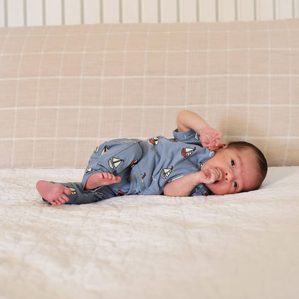 Stockist of Bonsie's Footless, sleeveless "ahoy baby" kimono romper featuring sailboat print