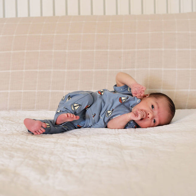 Stockist of Bonsie's Footless, sleeveless "ahoy baby" kimono romper featuring sailboat print