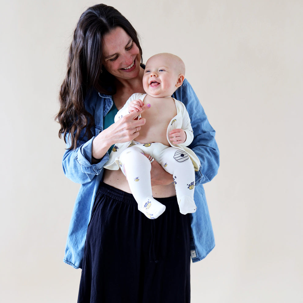 US stockist of Bonsie's Bees & Honey footed romper.
