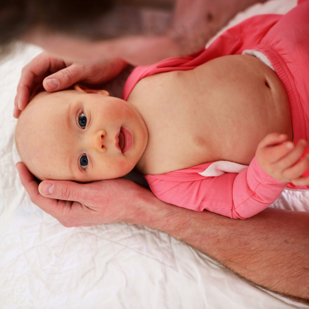 Stockist of Bonsie Babywear's Footed, vibrant "Pinky Promise" kimono style romper 