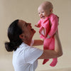Stockist of Bonsie Babywear's Footed, vibrant "Pinky Promise" kimono style romper 