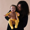 US stockist of Bonsie's Sunrise footed romper.