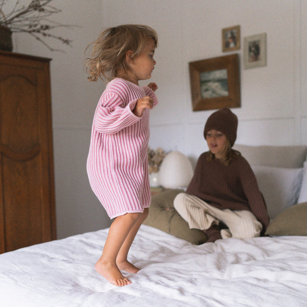 US stockist of Illoura the Label's long sleeve essential knit romper in Strawberry Stripe