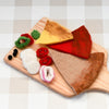 US stockist of Tara Treasures' felt Mediterranean pizza slice