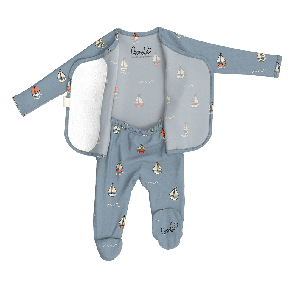 Stockist of Bonsie Babywear's Footed   "Ahoy Baby" kimono style romper featuring a print of sailboats