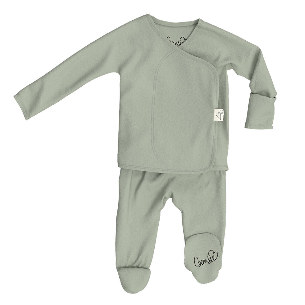Stockist of Bonsie's rayon blend avocado green footie.  Top section has velcro wrap body which can be undone for skin to skin contact.  Elastic waist that can be pulled down for easy diaper changes. 