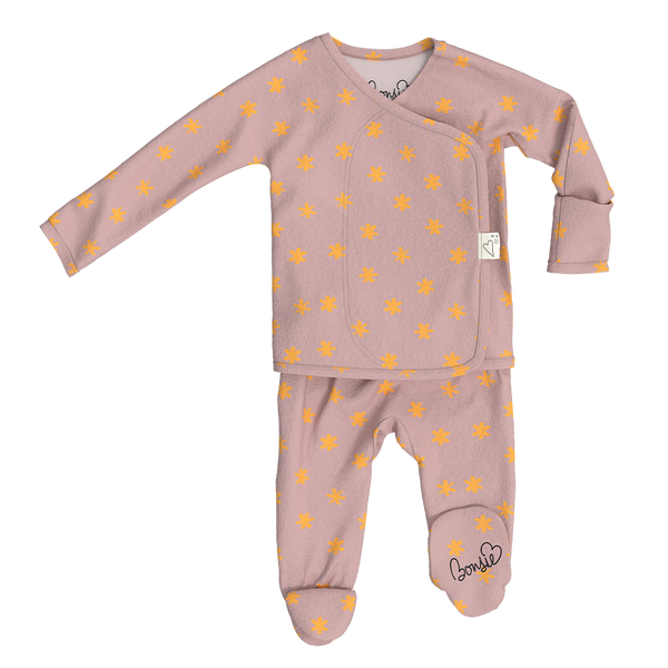 Stockist of Bonsie Babywear's Footed   muted pink kimono style romper featuring a print of stars