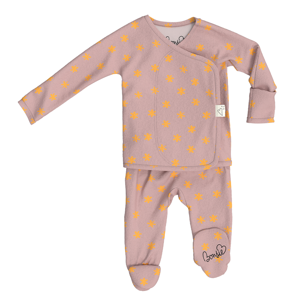 Stockist of Bonsie Babywear's Footed   muted pink kimono style romper featuring a print of stars
