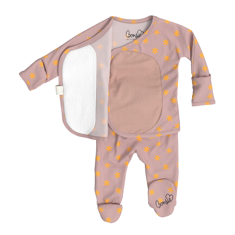 Stockist of Bonsie Babywear's Footed   muted pink kimono style romper featuring a print of stars