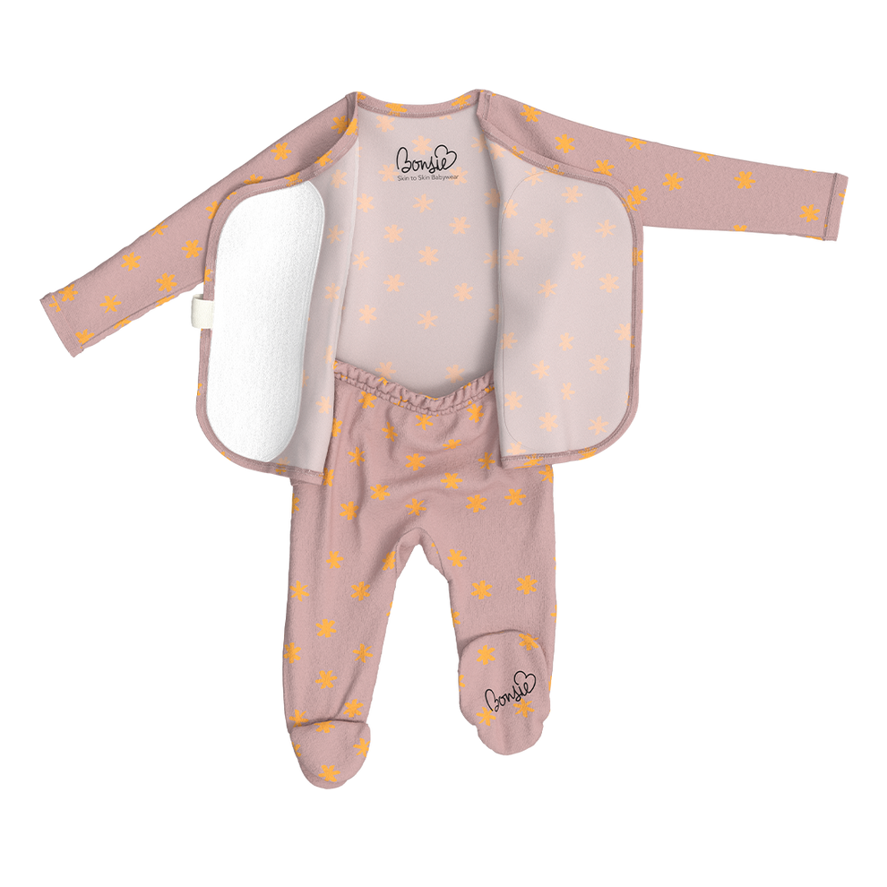 Stockist of Bonsie Babywear's Footed   muted pink kimono style romper featuring a print of stars