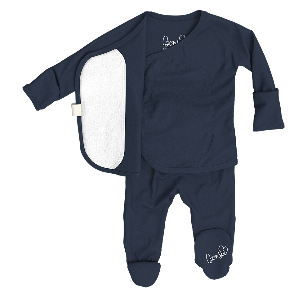 Stockist of Bonsie's rayon blend midnight blue footie.  Top section has velcro wrap body which can be undone for skin to skin contact.  Elastic waist that can be pulled down for easy diaper changes. 