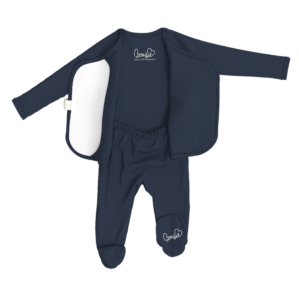 Stockist of Bonsie's rayon blend midnight blue footie.  Top section has velcro wrap body which can be undone for skin to skin contact.  Elastic waist that can be pulled down for easy diaper changes. 