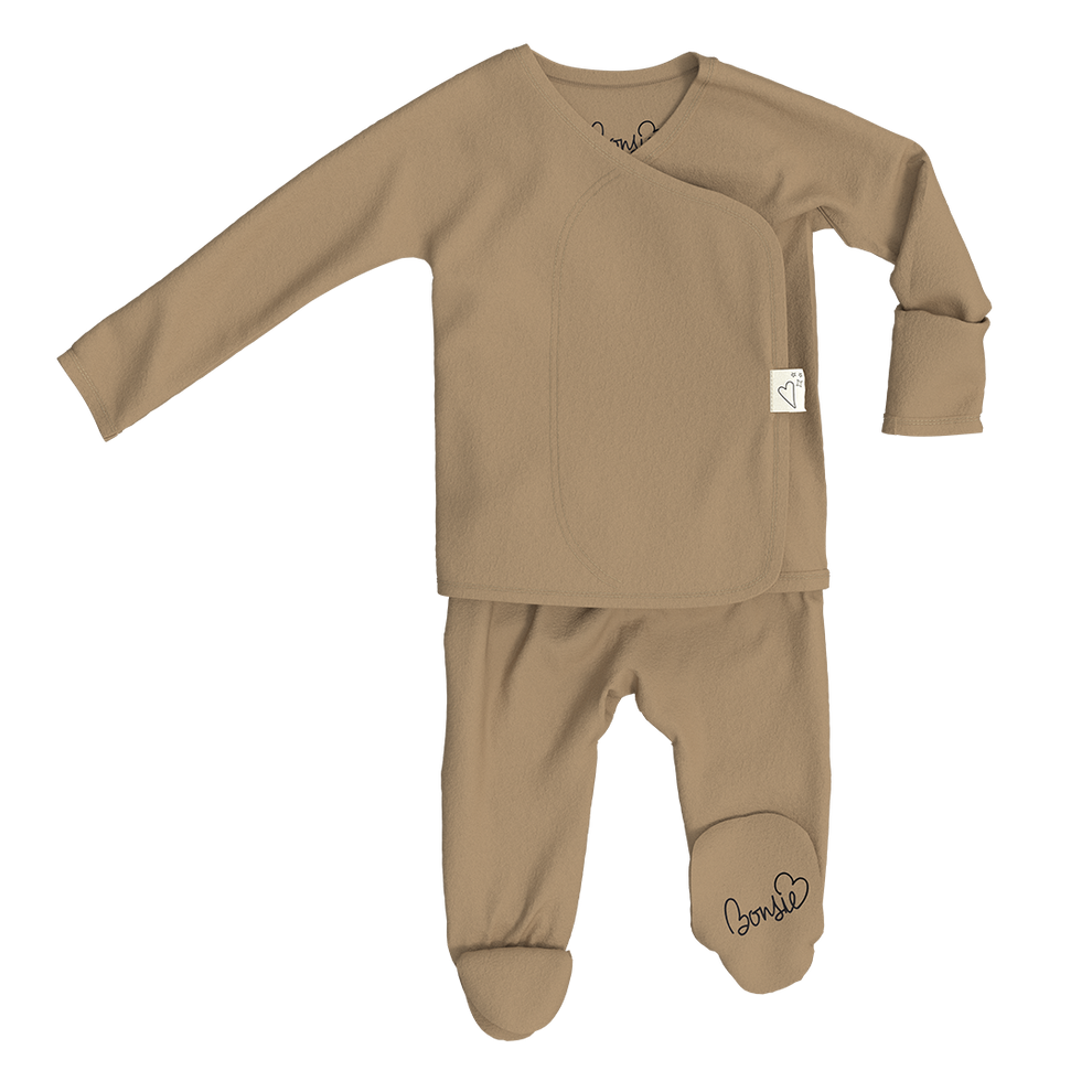 Stockist of Bonsie's rayon blend mocha footie.  Top section has velcro wrap body which can be undone for skin to skin contact.  Elastic waist that can be pulled down for easy diaper changes. 