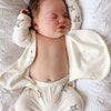 Stockist of Bonsie's rayon blend star print footie.  Top section has velcro wrap body which can be undone for skin to skin contact.  Elastic waist that can be pulled down for easy diaper changes. 