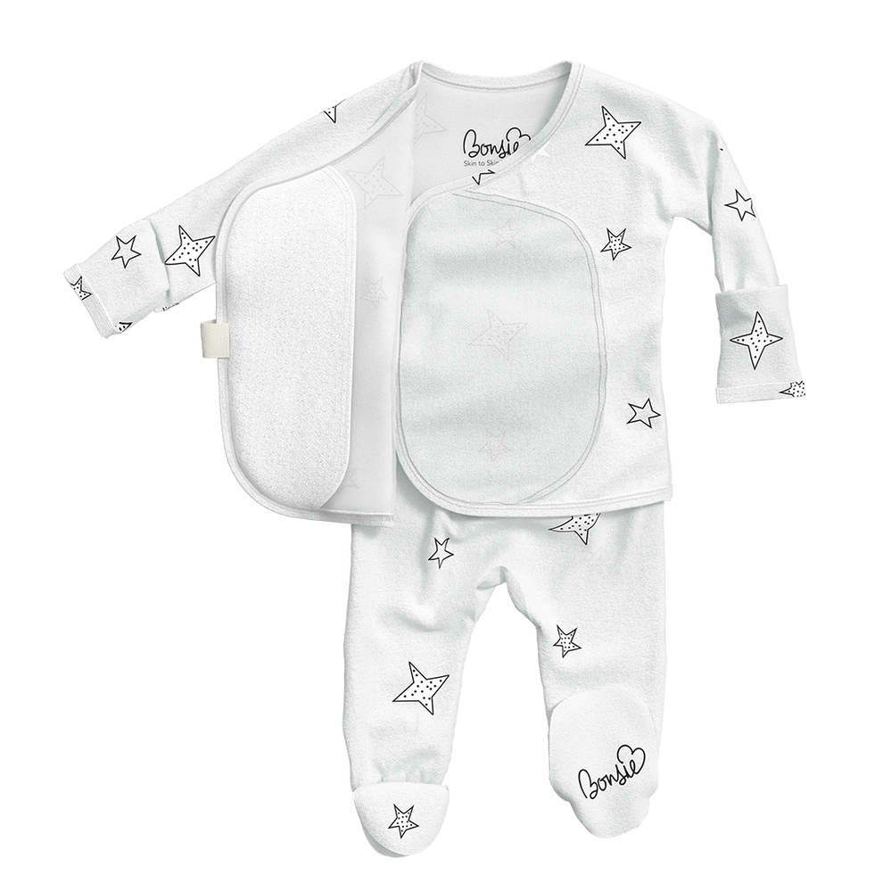 Stockist of Bonsie's rayon blend star print footie.  Top section has velcro wrap body which can be undone for skin to skin contact.  Elastic waist that can be pulled down for easy diaper changes. 
