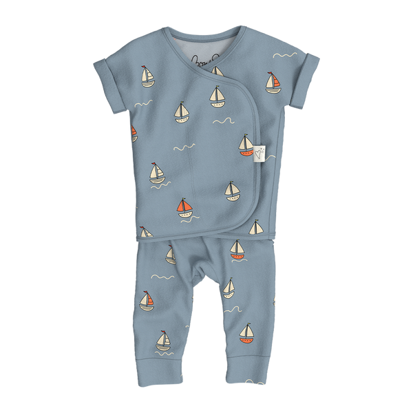 Stockist of Bonsie's Footless, sleeveless "ahoy baby" kimono romper featuring sailboat print