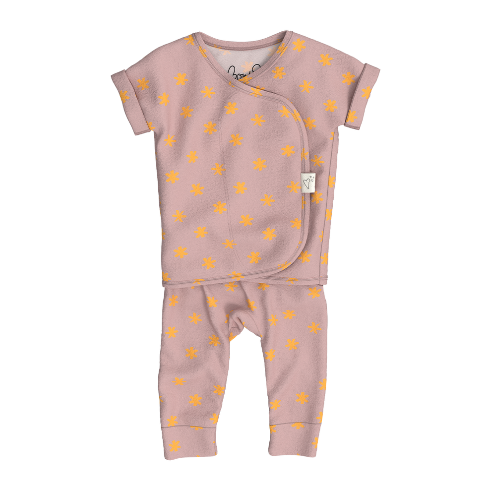 Stockist of Bonsie's Footless, sleeveless "Galaxy Gleam" kimono romper featuring star print
