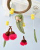 Baby mobile with hanging toys and a soft baby figure, featuring the brand 'May Gibbs'. US stockist of Tara Treasures