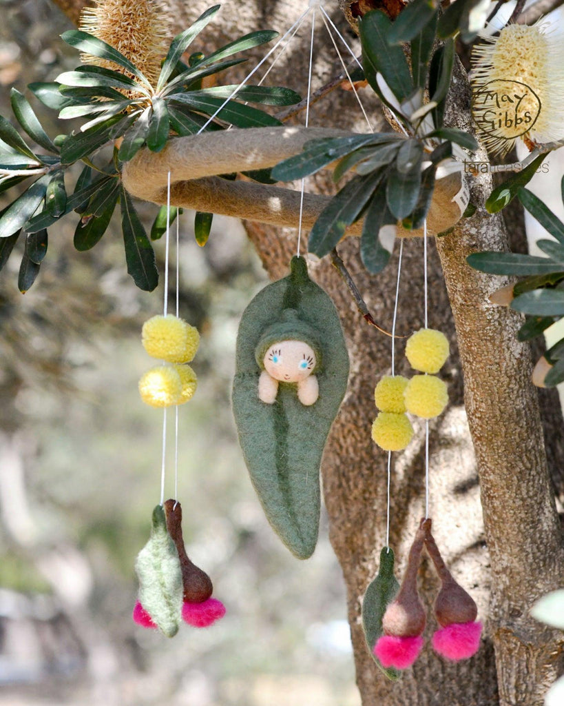 Baby mobile with hanging toys and a soft baby figure, featuring the brand 'May Gibbs'. US stockist of Tara Treasures