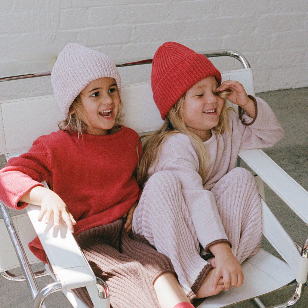 US stockist of Illoura the Label's Dusty Pink Essential Ribbed Knit 3/4 pants.  Has contrasting cocoa/cream on hem
