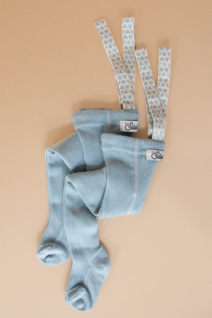 US stockist of Silly Silas' Misty Blue cotton footed tights with patterned braces