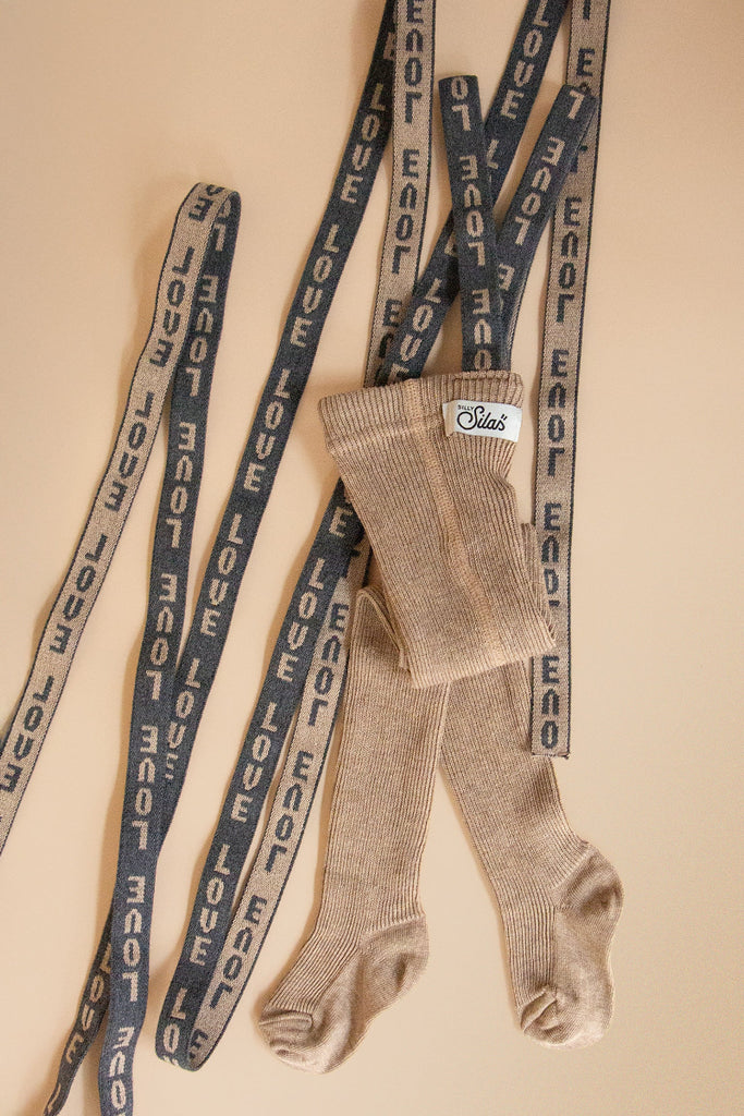 US stockist of Silly Silas' Peanut Blend cotton footed tights with LOVE patterned braces