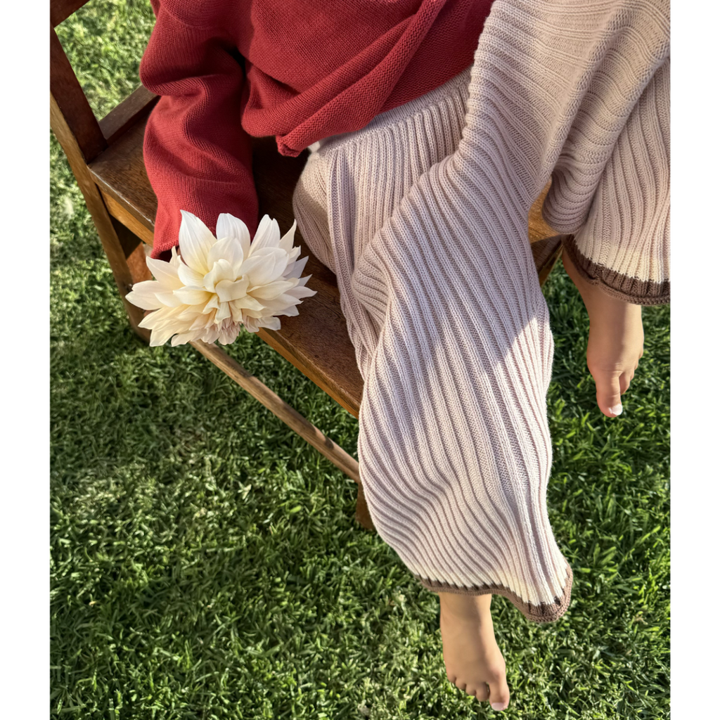 US stockist of Illoura the Label's Dusty Pink Essential Ribbed Knit 3/4 pants.  Has contrasting cocoa/cream on hem