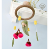 Baby mobile with hanging toys and a soft baby figure, featuring the brand 'May Gibbs'. US stockist of Tara Treasures