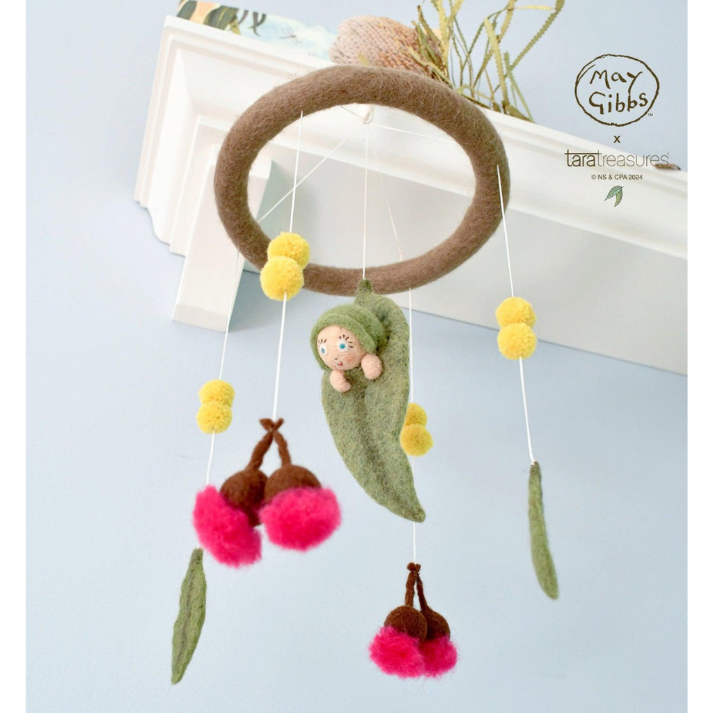 Baby mobile with hanging toys and a soft baby figure, featuring the brand 'May Gibbs'. US stockist of Tara Treasures
