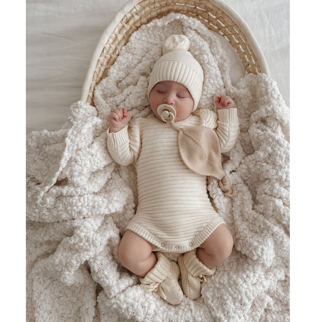 US stockist of Belle & Sun's Linear Knit Romper in Natural White