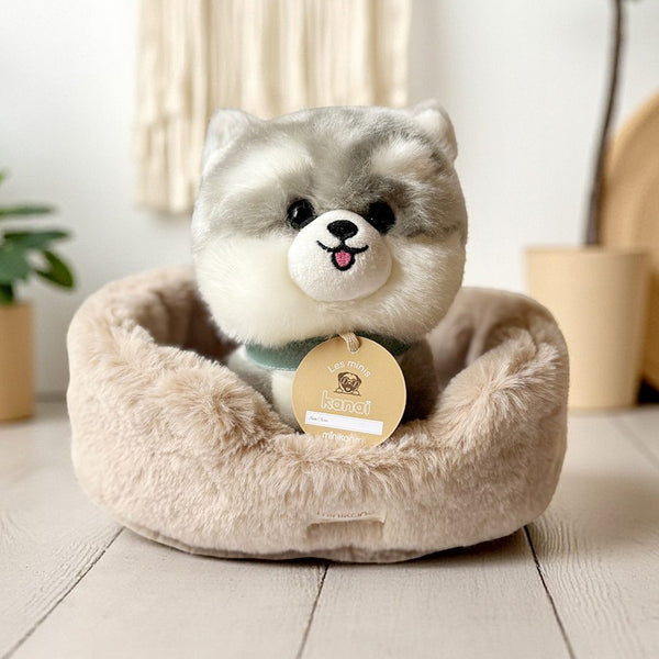 US stockist of Minikane's "Aiko" kanai plush puppy and beige faux rabbit fur dog basket.