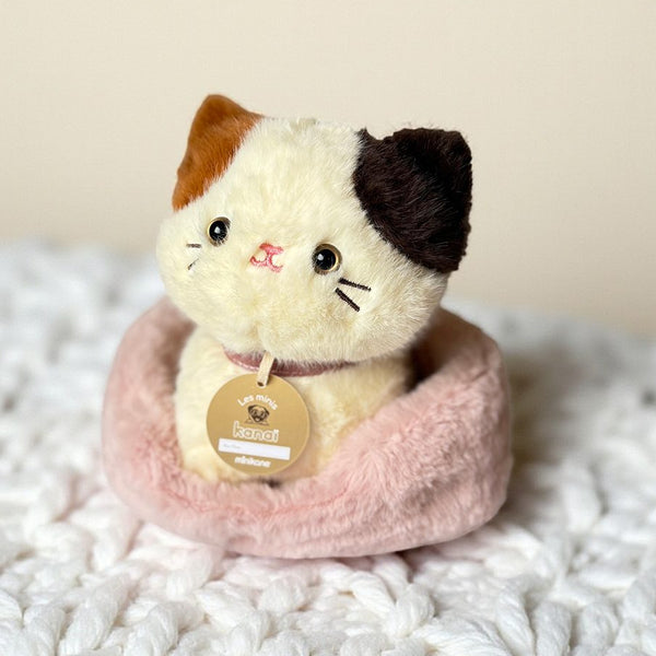 US stockist of Minikane's "Aiko" kanai plush puppy and beige faux rabbit fur dog basket.