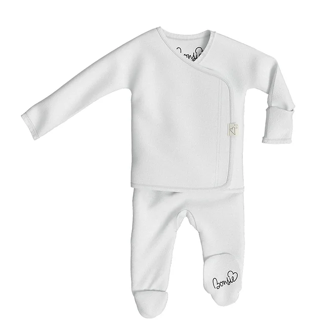 Stockist of Bonsie's rayon blend milk footie.  Top section has velcro wrap body which can be undone for skin to skin contact.  Elastic waist that can be pulled down for easy diaper changes. 