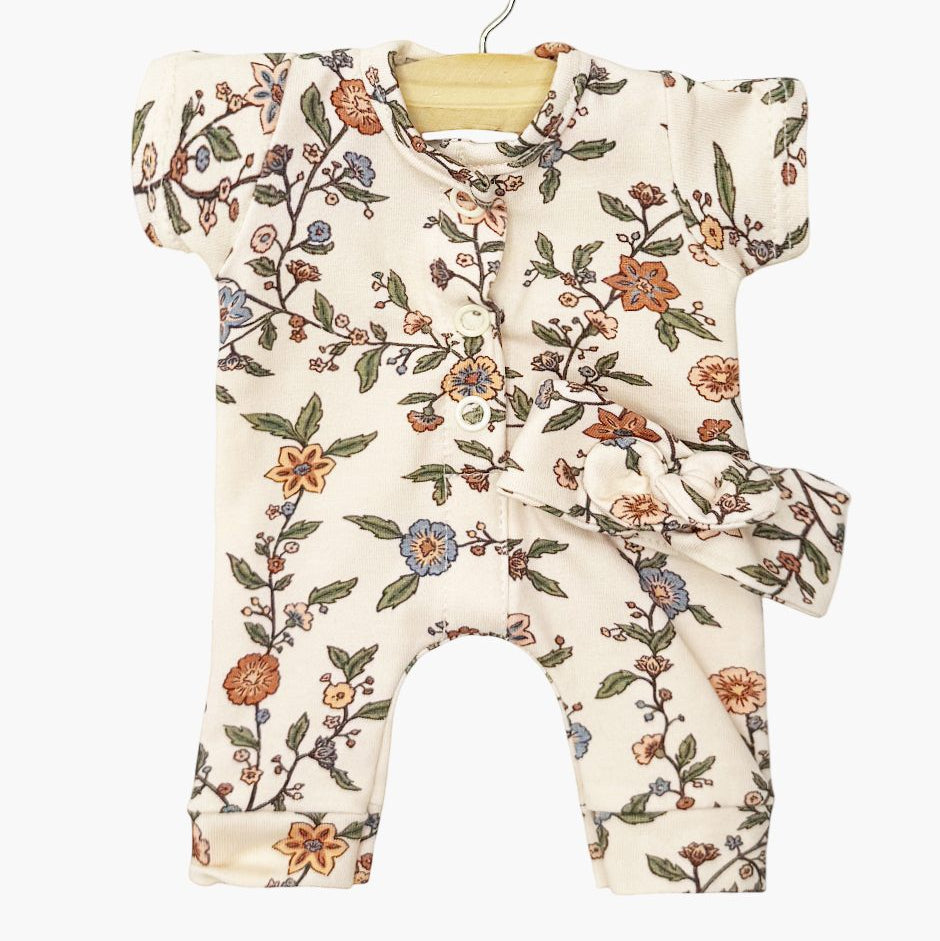 US stockist of Minikane's Babies Lili Jumpsuit with matching headband in "Gisele" floral print.