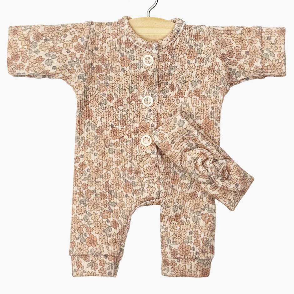 US stockist of Minikane's Babies Cocoa Flowers Lili jumpsuit with matching headband