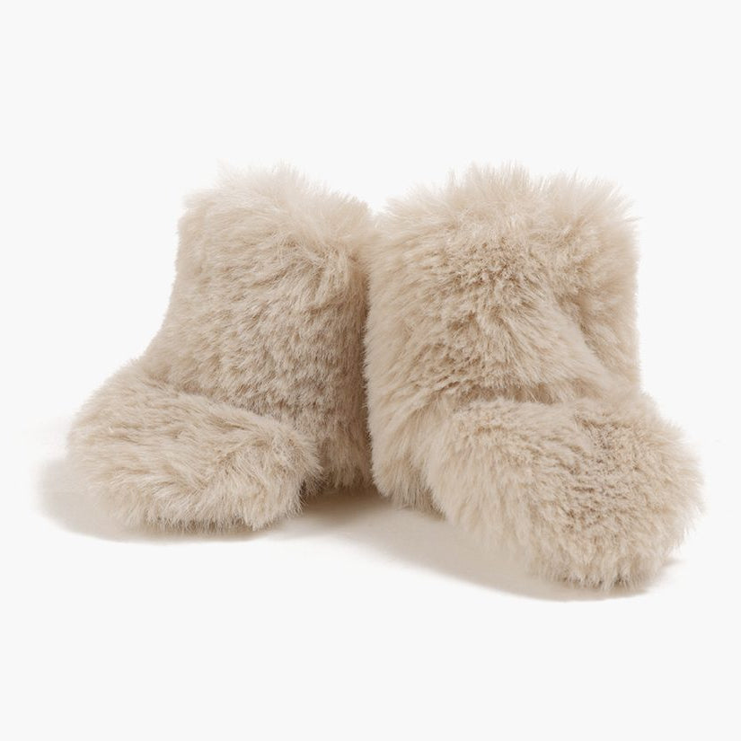 US stockist of Minikane's faux fur Beige snow boots