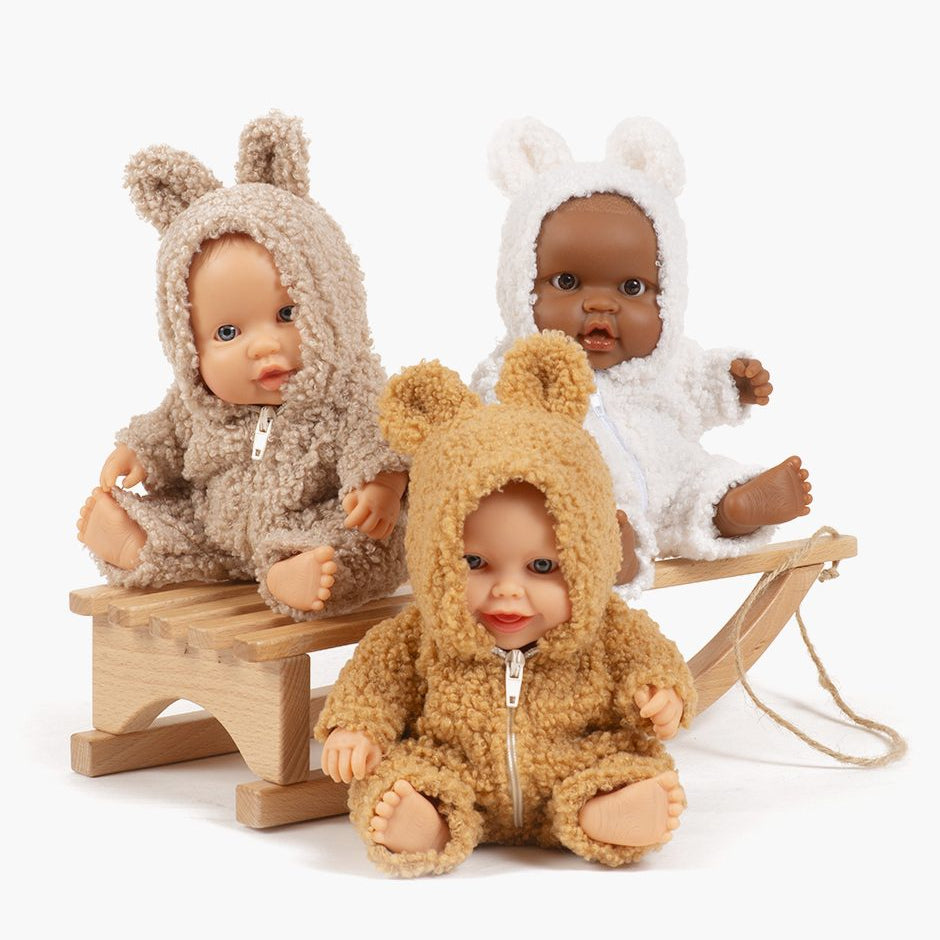 US stockist of Minikane's Guillo Peques doll dressed in his Camel Winnie the Pooh jumpsuit.