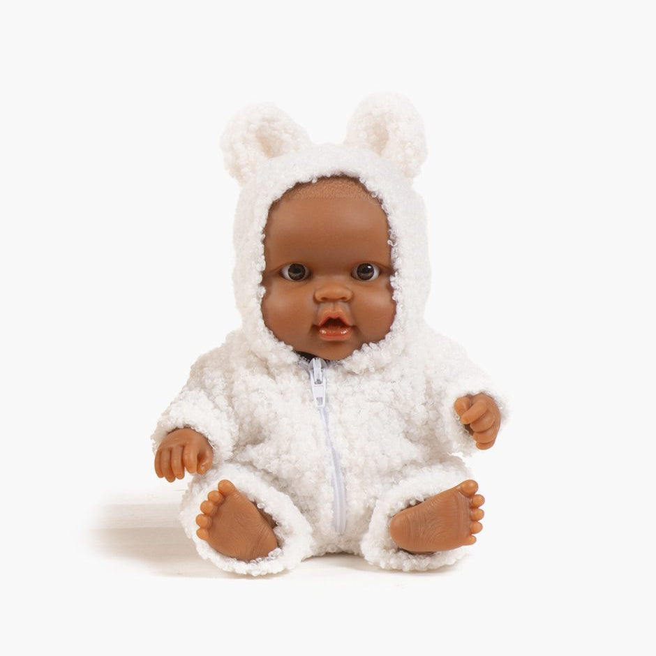 US stockist of Minikane's Hebe Peques doll dressed in her Ecru Winnie the Pooh jumpsuit