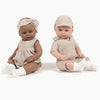 US stockist of Minikane's Augustine Bambini girl doll in her Beige cotton gauze set with matching headband