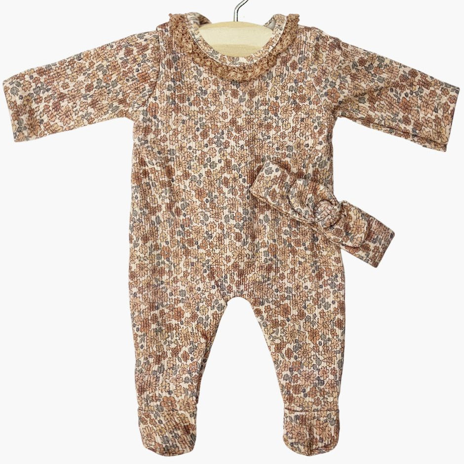 US stockist of Minikane's Angleo Sleep well set in Cocoa Flowers and with a matching knot headband.