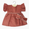 US stockist of Minikane's Daisy dress with matching twist headband in Marsala corduroy.  For bambini dolls.