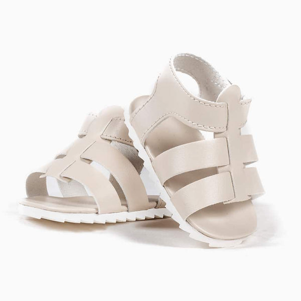 US stockist of Minikane's gender neutral cream sandals for Bambini dolls
