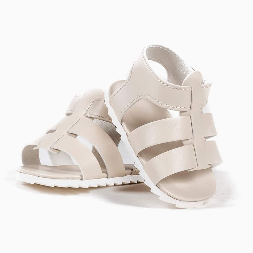 US stockist of Minikane's gender neutral cream sandals for Bambini dolls